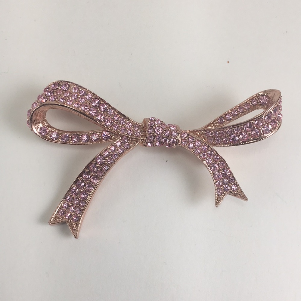 Kenneth Jay Lane pink crystal bow brooch